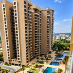 Pebble Bay luxury apartments with landscaped grounds and swimming pools RMV stage.
