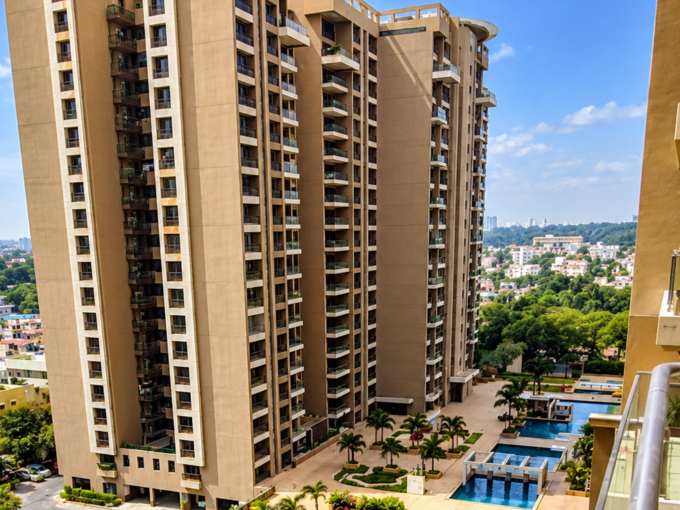 Pebble Bay luxury apartments with landscaped grounds and swimming pools RMV stage.